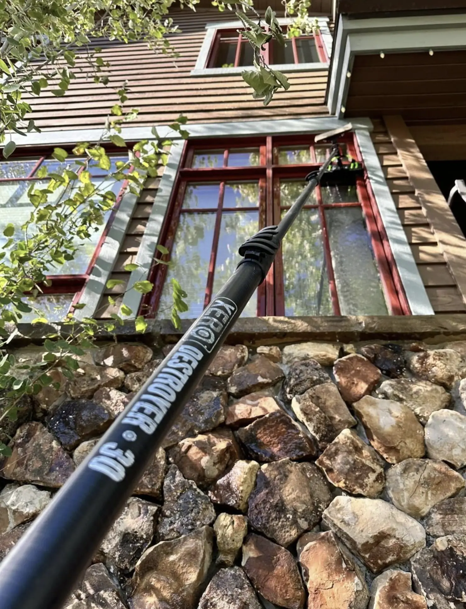 How do you clean double storey house windows?